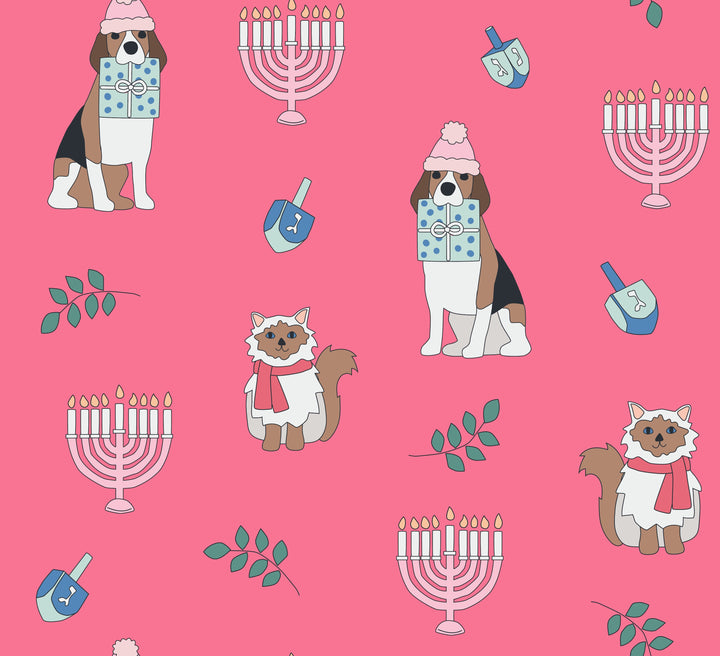 Pink fabric with a pattern of dogs holding gifts, cats in scarves, menorahs, and dreidels.
