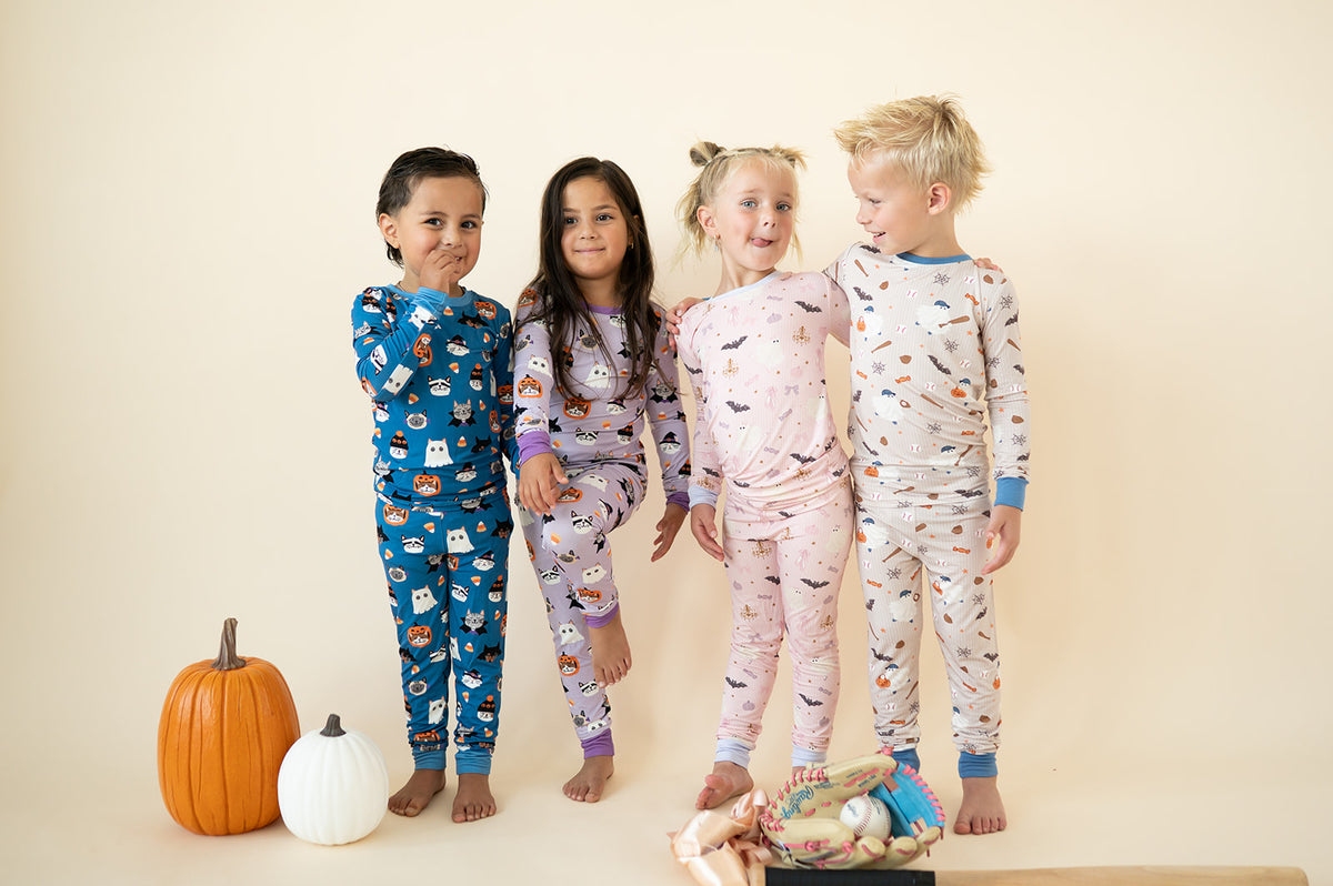 DreamLet children wearing matching Halloween pajamas